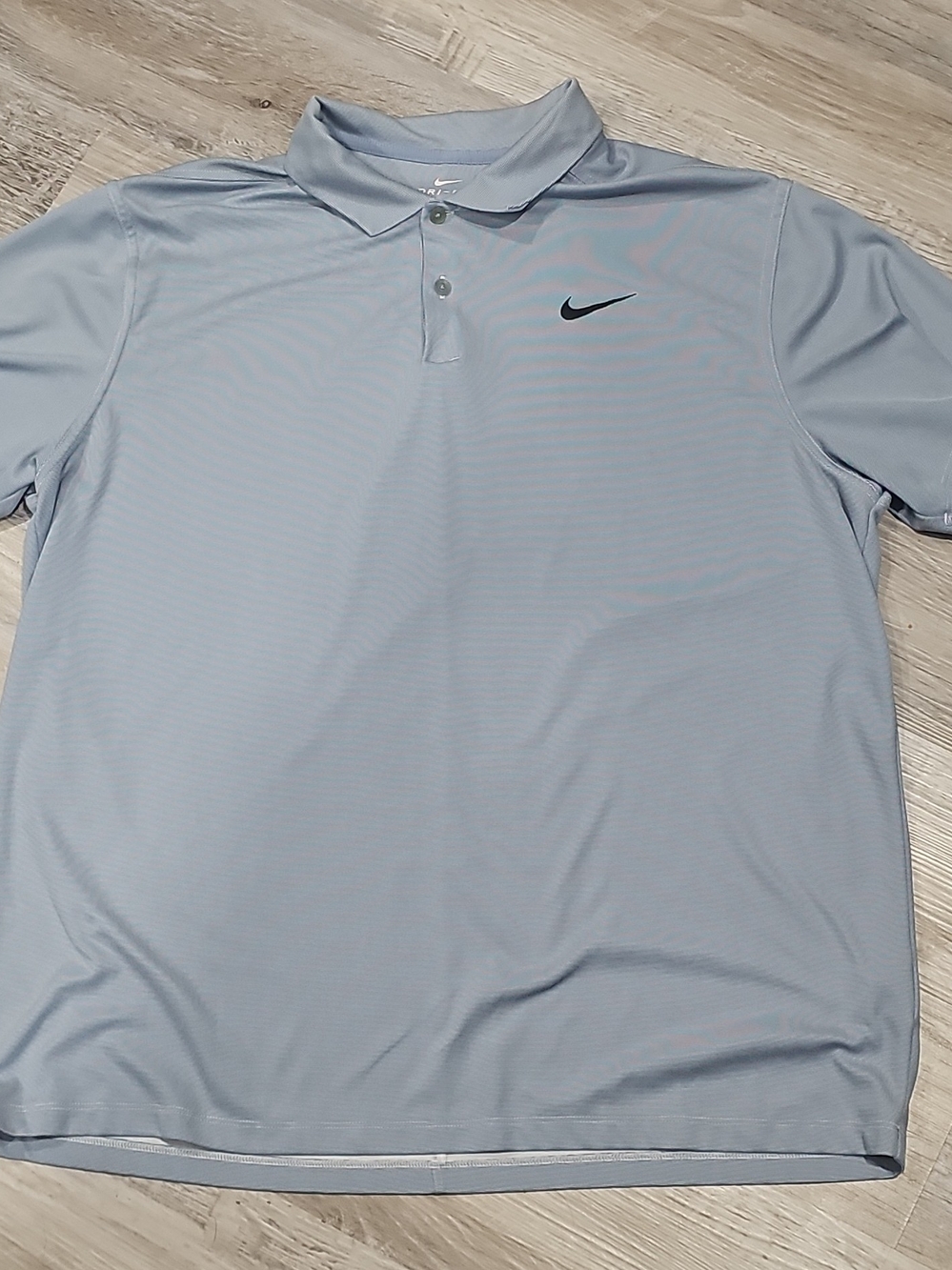 Nike Men’s Light Blue Polo with Black Swoosh